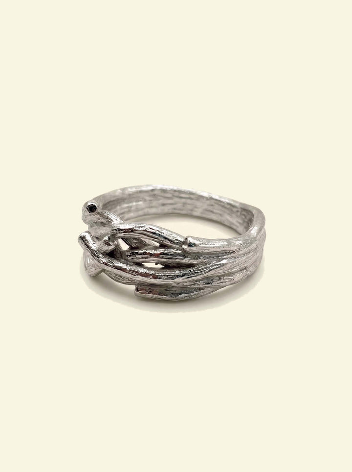 Oak Ring, silver-tone band of intertwined twig-textured branches, 3/4 view