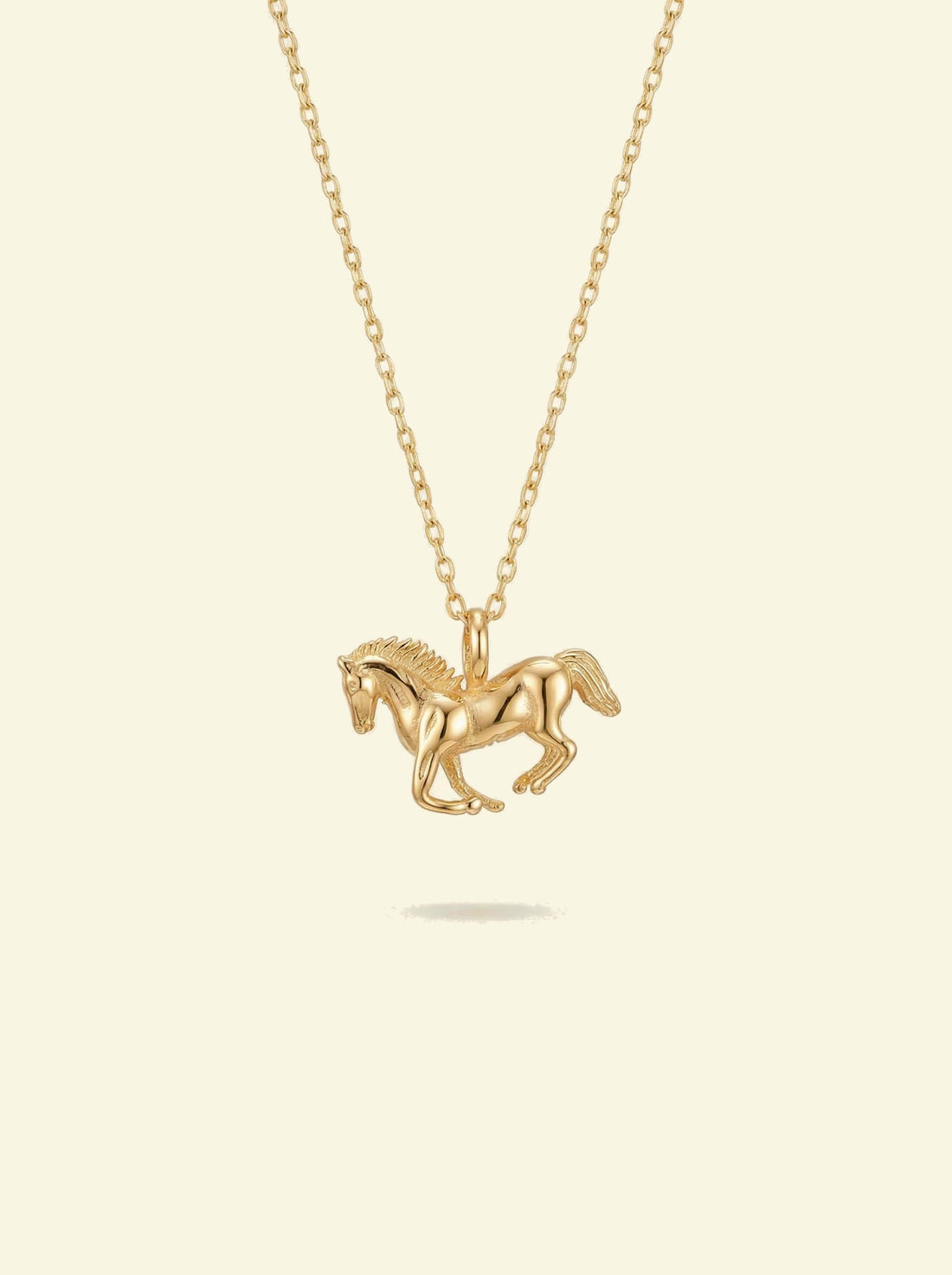 Stallion Pendant, gold-tone horse pendant on a cable chain, horse facing left, side view