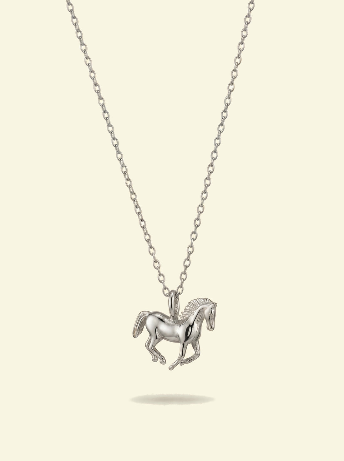 Stallion Pendant, silver-tone galloping horse pendant on a fine cable chain, front view
