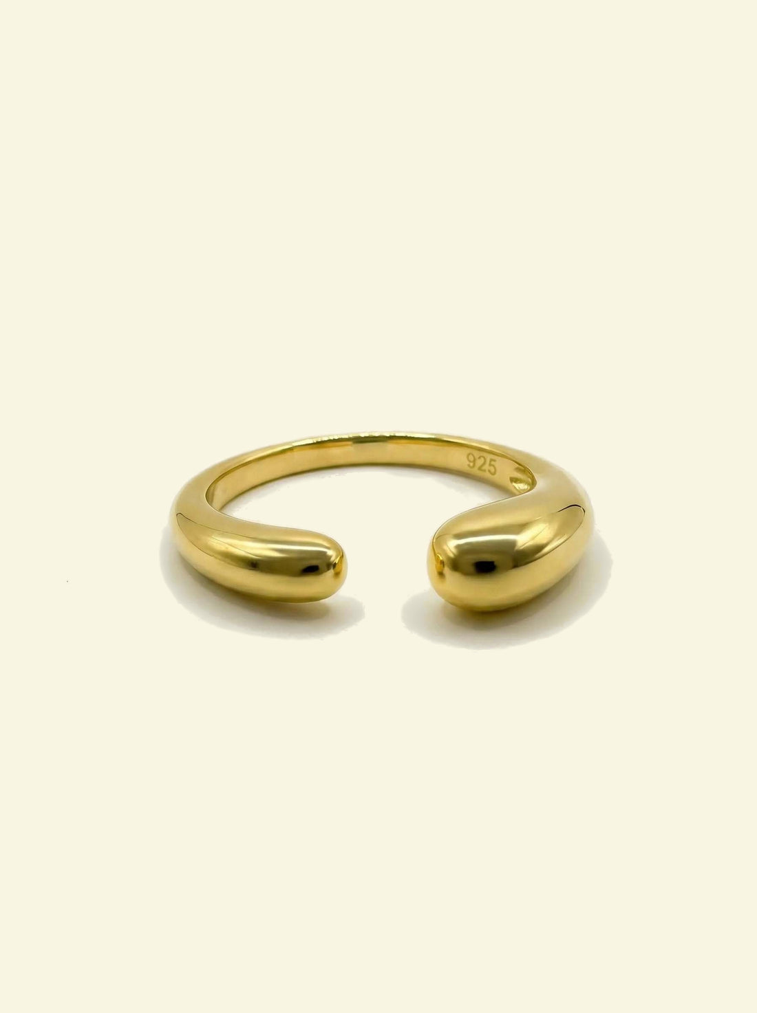 Sap Ring, gold-tone open ring with two rounded drop-shaped ends, front view