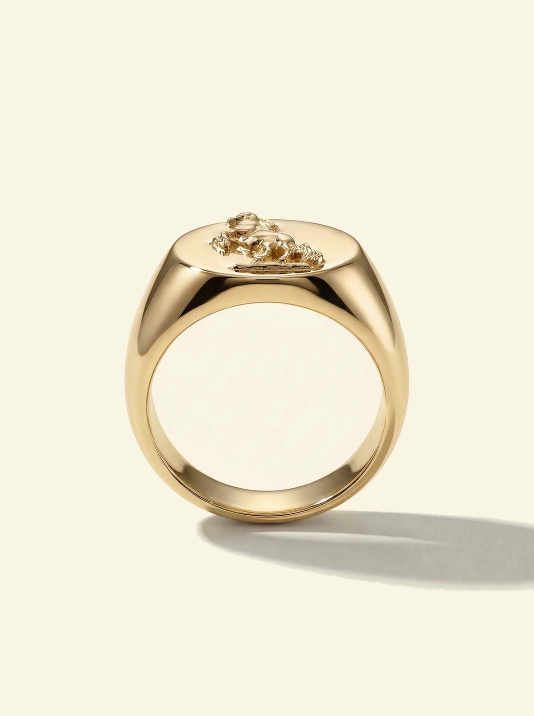 Stallion Signet, gold-tone signet ring standing upright, side profile with the horse relief small on top