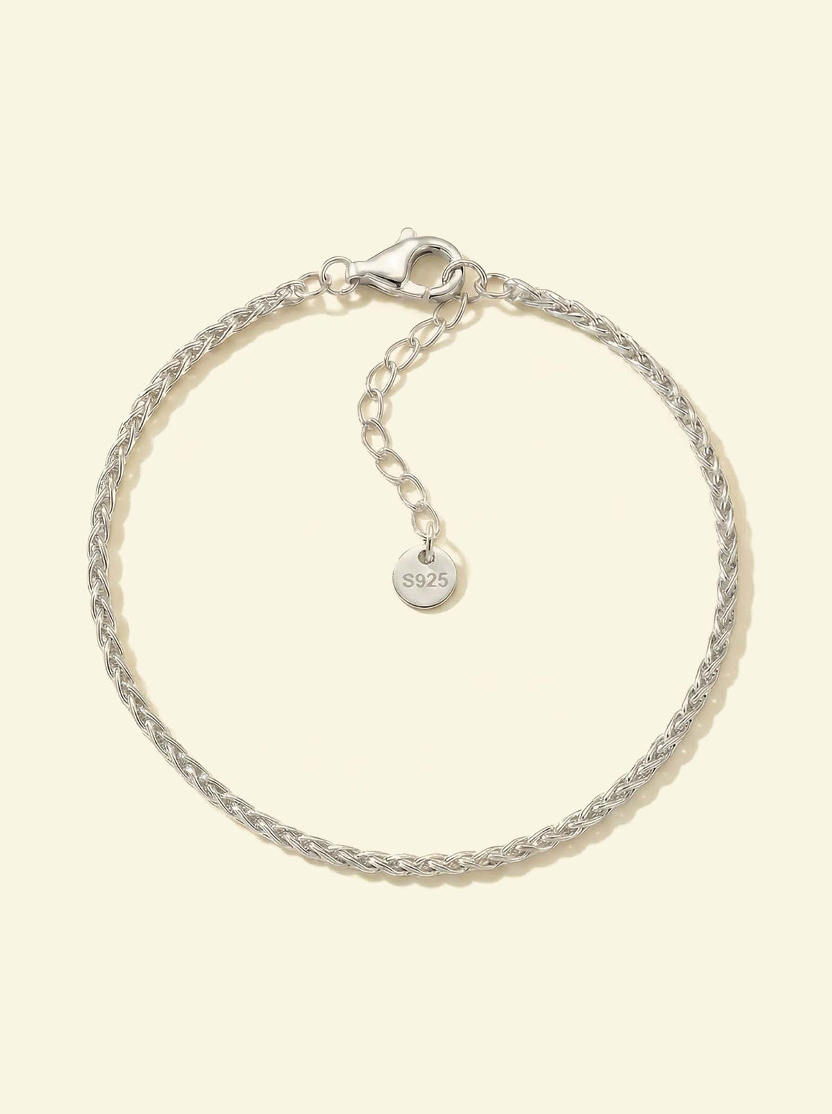Essential Chain Bracelet, silver-tone braided chain flat lay with lobster clasp, extender chain and S925 tag